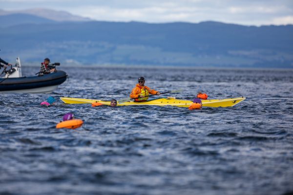 Sea kayaks and RIBs working together